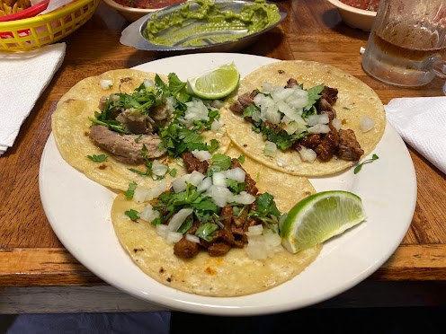 Street tacos with onion, cilantro and lime