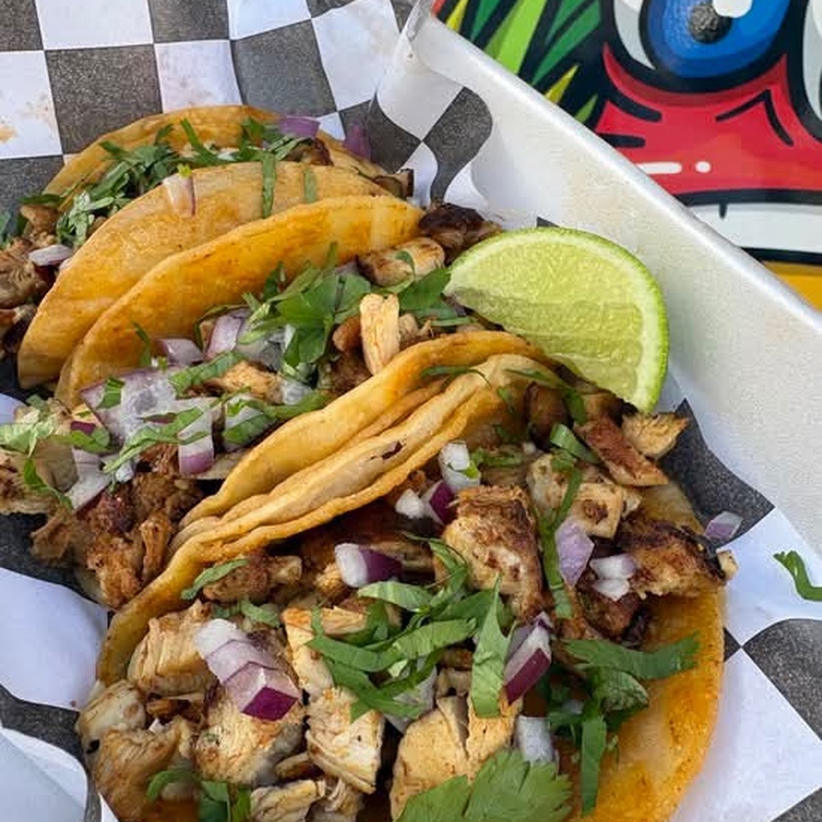 Tacos with onion, cilantro and lime