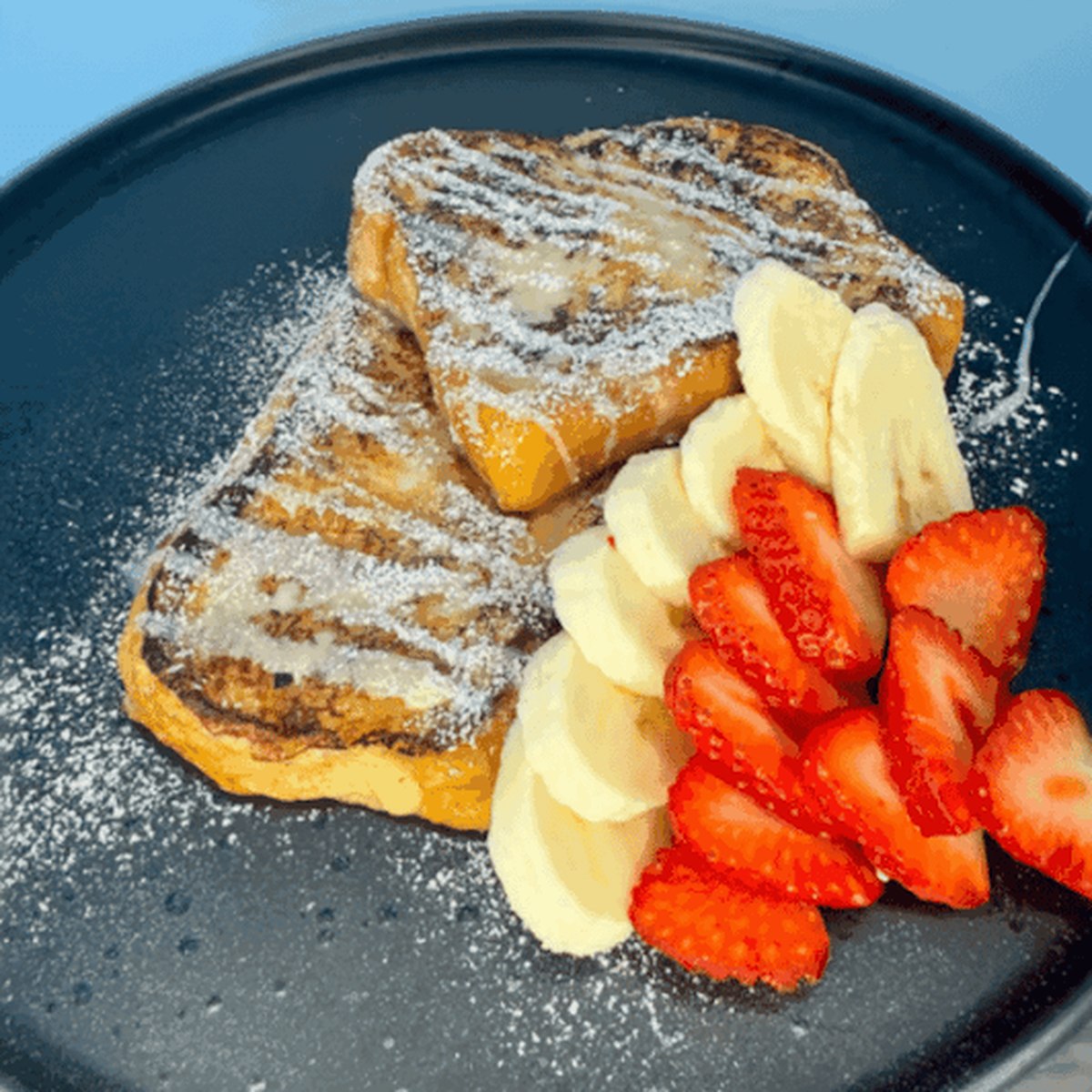 Toast plate with strawberries and banana